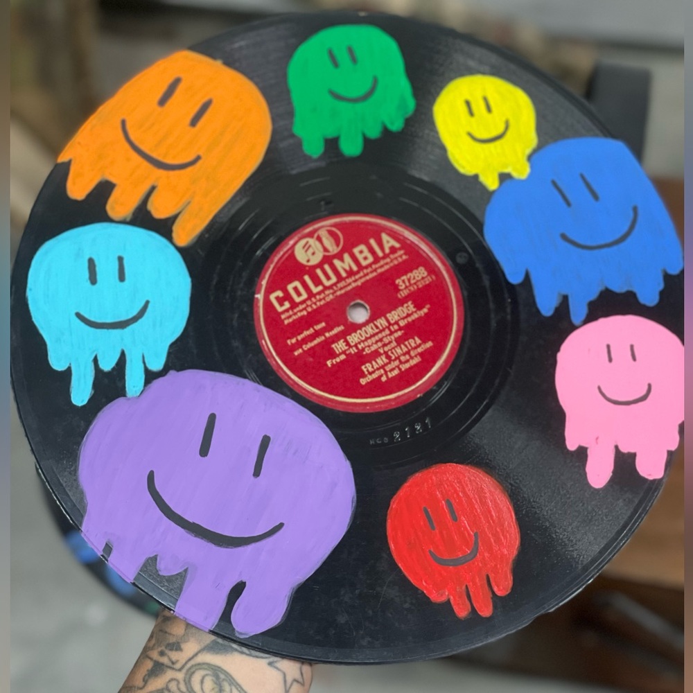 Hand painted vinyl record.